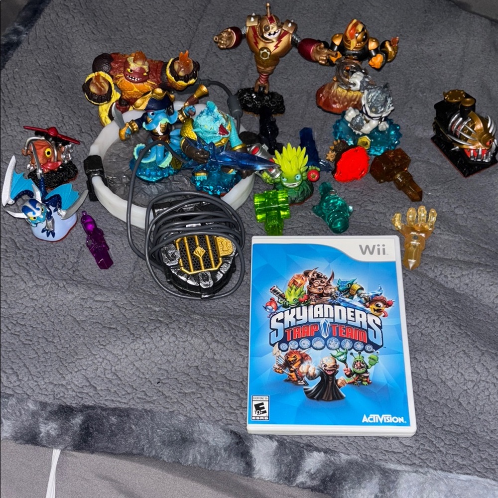 Skylabders portal, Wii game, and action figurines pictured